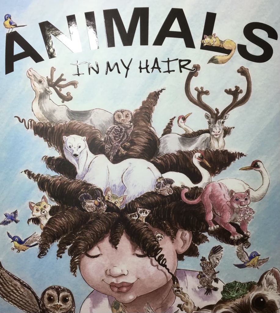 Photo of the Animals In My Hair Cover showing the reflective Spot UV.